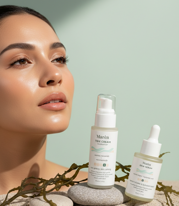 Marèn Dew Serum and Tide Cream arranged on a minimalist coastal background with sea stones, highlighting hydration for Ramadan skincare