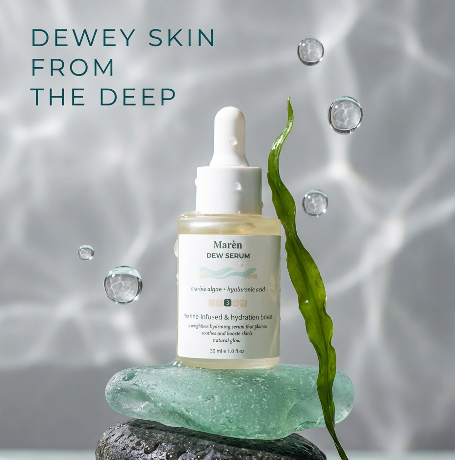 Marèn Dew Serum bottle with marine algae and hyaluronic acid, balanced on wet sea stones with a floating kelp leaf and water bubbles, showcasing a premium hydration treatment for acne-prone and glowing skin.